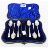 A cased set of six silver teaspoons and matching sugar tongs with engraved decoration - Sheffield