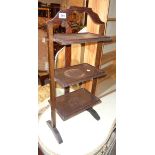 A 1930's stained mixed wood three tier folding cake stand