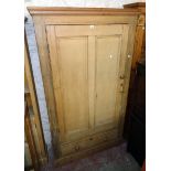 A 3' 7" Victorian pine wardrobe with later moulding to top, hanging space enclosed by a panelled