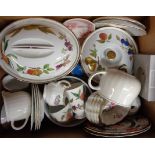 A box containing a quantity of Royal Worcester Evesham ware including tureens, ramekins, cups and