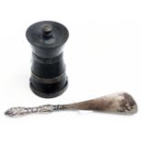 A silver bound ebony pepper grinder - sold with a silver handled shoe horn - various condition