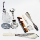 A collection of silver and other items including squat candlestick, vase, shoehorn, perfume