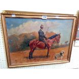 A gilt framed oil on canvas depicting a horse and rider in a field with an Old English Sheepdog