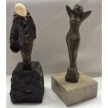 A 1920's German Art Deco bronze sculpture of Pierrot doffing his hat and set on a rough stone