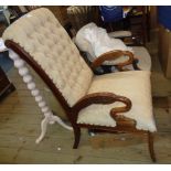 A reproduction mahogany part show frame drawing room armchair in the antique style with button