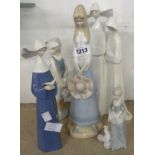 Two Lladro nuns, a Nao figure and two similar