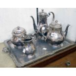 An early 20th Century French four piece silver plated tea and coffee set, on tray with flanking