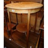 A 24" diameter Edwardian inlaid mahogany two tier occasional table - sun bleaching and staining