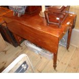 A 35 1/2" Victorian mahogany Pembroke table with drawer to one end and opposing dummy drawer