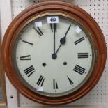 A Victorian stained walnut framed dial wall timepiece, the 11 3/4" painted dial with re-painted