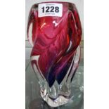 A Murano magenta and violet cased glass swirl form vase