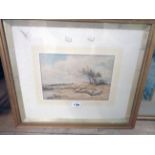 W. Jones: a gilt framed English school watercolour depicting sheep grazing beside a river - signed
