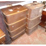 Two vintage bentwood and metal bound travelling trunks, both with brown canvas weather coating