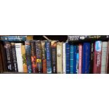 A collection of modern hardback novels, mainly with printed dust covers including Clive Cussler, Ken