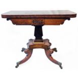 A 36" late Regency mahogany ebony strung and inlaid fold-over card table with shaped apron, set on