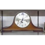 A 20th Century polished walnut cased Napoleon hat mantel clock with dial marked for H. Samuel and