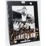 Nat Lofthouse: an unframed mounted monochrome photograph signed by the player with certificate verso