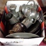 A box containing various pieces of antique and other pewter