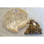 A carved mother of pearl plaque and a Japanese cast brass figural plaque