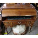 A 3' 3" late 19th Century mahogany cylinder bureau with fitted interior and rexine inset writing