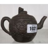 A Chinese Yixing terracotta teapot with lion on lid
