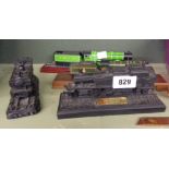 Four display model trains comprising two coal made examples, one Lilliput Lane and another