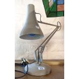 An Anglepoise lamp with mushroom finish