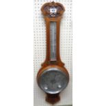 A 1930`s walnut cased banjo barometer/thermometer with printed metal dial and scale, aneroid works