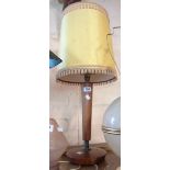 A mid 20th Century turned hardwood and brass table lamp