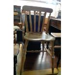 Two pairs of 20th Century Windsor style kitchen chairs with moulded solid elm seats, set on turned