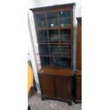 A 27" 19th Century mahogany two part book cabinet with Greek key cornice and adjustable shelves