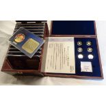 A Windsor Mint Queen's Diamond Jubilee .585 gold coin set - sold with a cased gold plated set