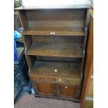 A 23 3/4" late 19th Century mahogany miniature dresser style unit with three shelf open waterfall