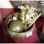 An Indian brass bowl - sold with a brass bull, ball, etc.