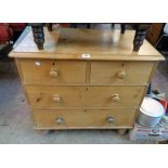 A 34" Victorian waxed pine chest of two short and two long graduated drawers, set on turned legs -