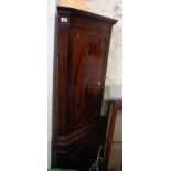 A 24" reproduction flame mahogany veneered corner cupboard with dentil cornice, two beaded doors and