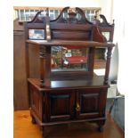 A 23" reproduction mahogany freestanding display stand with mirror panel to back and two shelves