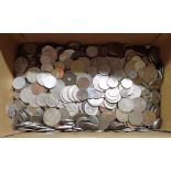 A box containing a collection of world coinage