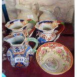 A pair of Ironstone hydra jugs, a hexagonal Mason's Ironstone jug with serpent handle, a pair of