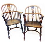 Two similar antique elm Windsor elbow chairs, both with double pierced splat backs and solid moulded