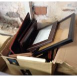 A box containing a quantity of leather and other photograph frames