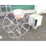 An aluminium chimney cowl and a galvanised hose reel