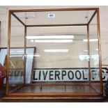 A display case for a model boat