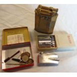 Three old cigarette lighters and a Ronson Service Outfit tin with various contents