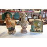A vintage painted plaster figure of a girl with an umbrella, a figural clock with shepherdess and
