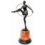A modern Art Deco style bronze lady with hoop, set on marble plinth base