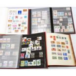 Three stock books containing 20th Century commemorative and other stamps - sold with an album of