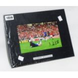 Norman Whiteside: an unframed mounted photograph signed by the player and with Allstars