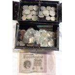 A vintage cash tin containing a quantity of mid 20th Century Great British coinage