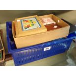 A quantity of vintage games and cards including building blocks, draughts, checkers, table tennis,